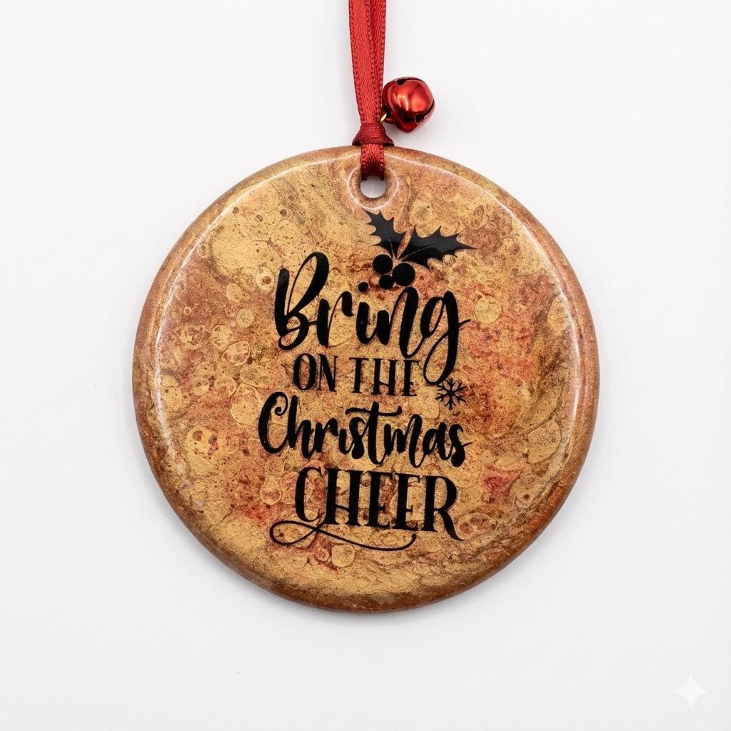Round Christmas ornament with 'Bring on the Christmas Cheer' text and holly design.